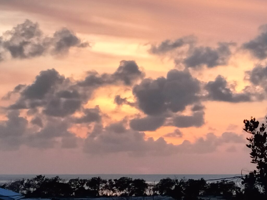 A cloudy sunset over Caye Caulker